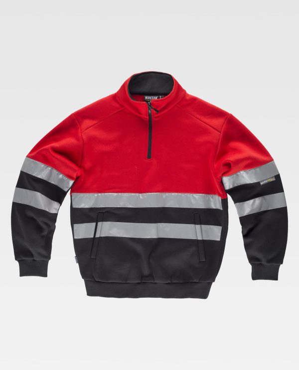 Miliar Ropa Laboral Sudadera combinada con cintas reflectantes. Cuello alto con cierre de media cremallera y costuras reforzadas. Dos bolsos laterales interiores. Dos cintas reflectantes en pecho, espalda y mangas. Suave y cálido acabado en el interior. Puños y cintura elásticos en punto canalé.